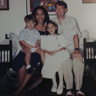 Christmas in the Philippines in the early ’90s. Clockwise from top right: my father, William Branigin; me; my brother, Michael; and my mother, Bing.